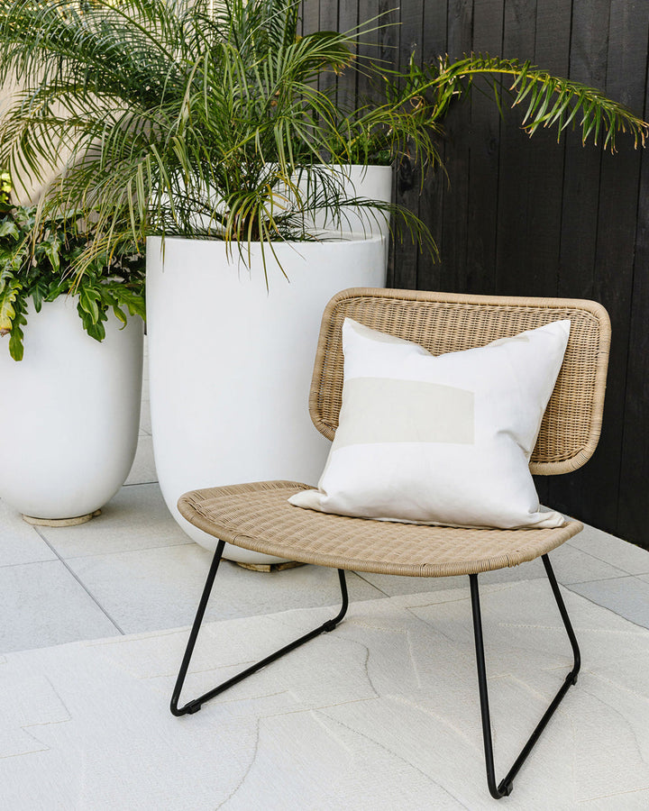 Meelan Cushion Inspired by Brutalist forms, expressive, graphic shapes are captured in beige and white in Meelan, our statement design for summer. Pair with matching Copacabana rug in bone, for a subtle, tone-on-tone look you will enjoy for years to come.