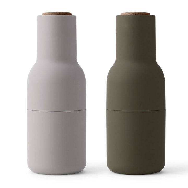 Audo CPH Bottle Grinders by Audo Copenhagen - The bottle-shaped design invites a playful and experimental approach to grinding. Equipped with a robust ceramic mechanism, this grinder effortlessly handles a variety of dried spices, seeds, salt, and pepper.