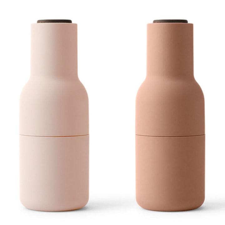 Audo CPH Bottle Grinders by Audo Copenhagen - The bottle-shaped design invites a playful and experimental approach to grinding. Equipped with a robust ceramic mechanism, this grinder effortlessly handles a variety of dried spices, seeds, salt, and pepper.