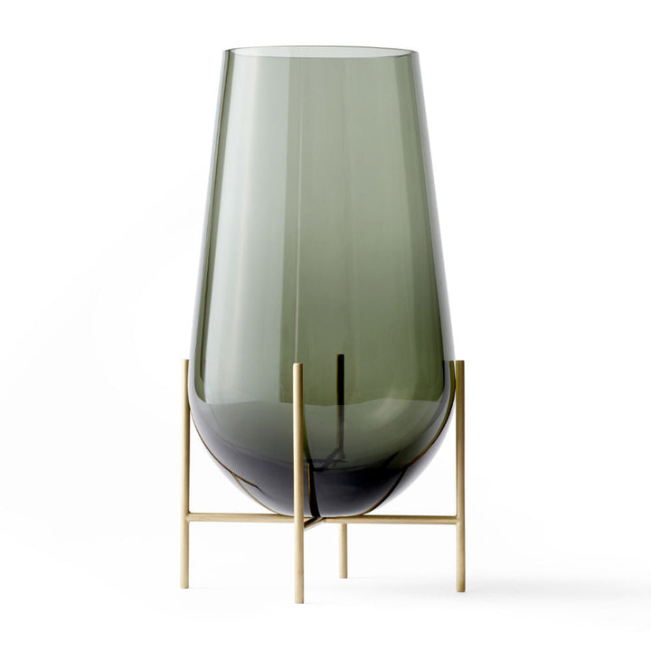 Audo CPH Echasse Vase - Medium by Audo Copenhagen - The Échasse Collection reinterprets the timeless elegance of glass vases and bowls by combining a minimalist profile with a refined, playful character suited for both modern and classic interiors. Theres