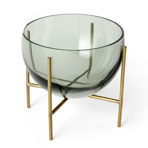 Audo CPH Echasse Bowl - Small, Green Smoke / Brass by Audo Copenhagen - The Échasse Collection reinvents the timeless sophistication of glass vases and bowls with a minimalist design that adds a refined yet playful touch to both contemporary and classic i
