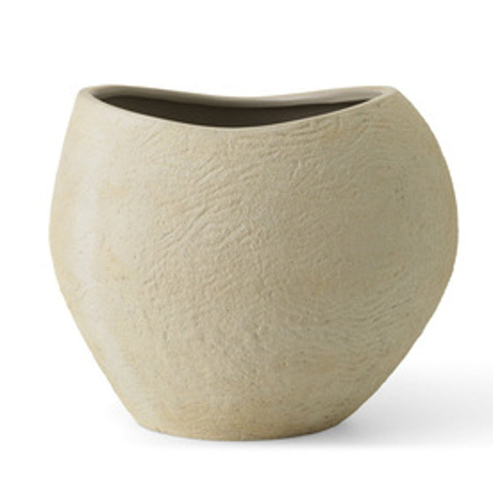 Audo CPH Plantas Planter (Height 32 cm), Ivory by Audo Copenhagen - Product Information: Characterised by their curves and irregular, furrowed surface, the Plantas Planters are made from matte ivory stoneware with a textured, natural appearance. Each piec