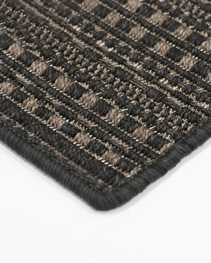 Mendoza Floor Rug Suitable for use both in and outdoors, the Mendozaâ€™s finely patterned weave and timeless colourway provides the perfect base for styling a refined exterior space. The understated design makes this piece easy to pair with flooring and f