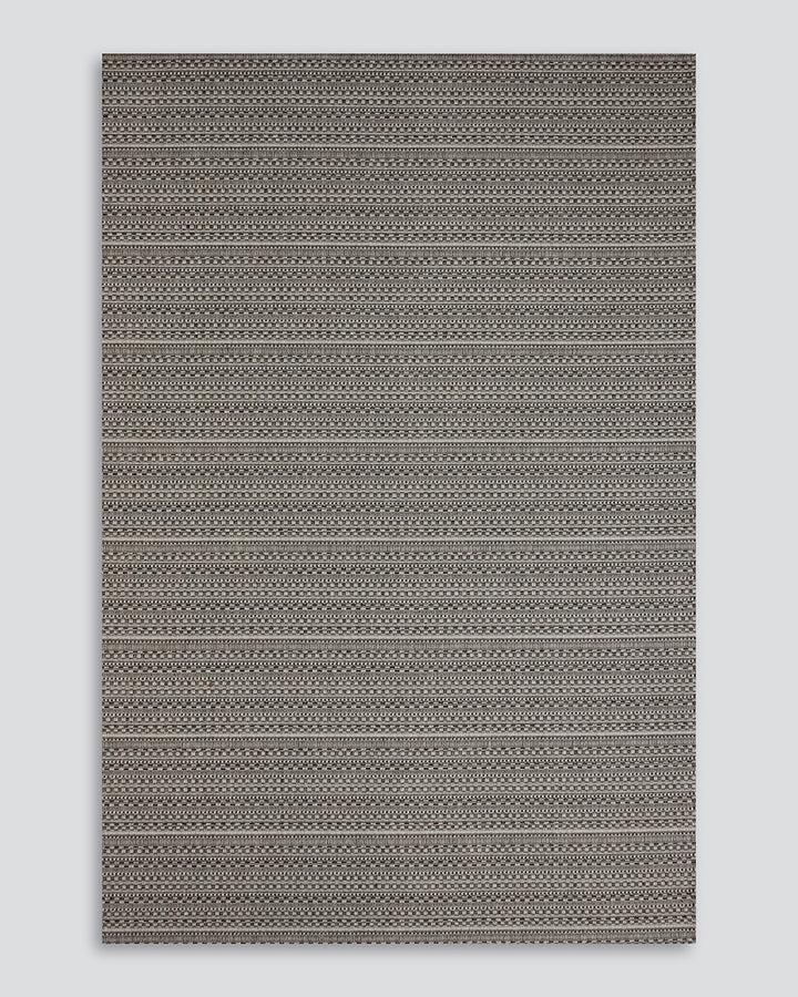 Mendoza Floor Rug Suitable for use both in and outdoors, the Mendozaâ€™s finely patterned weave and timeless colourway provides the perfect base for styling a refined exterior space. The understated design makes this piece easy to pair with flooring and f