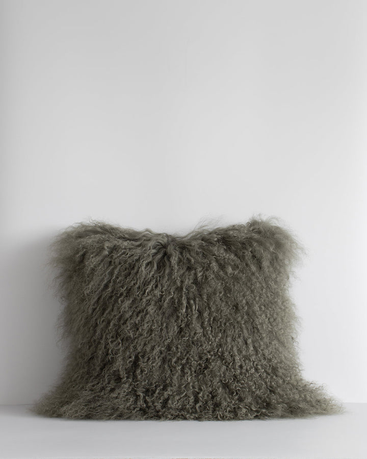 Meru Tibetan Lamb Cushion Bring a cosy, inviting feel to a room with the impossibly soft texture of Tibetan lamb fur. Gorgeously shaggy with a natural curl, the Meru engages senses with its sumptuous tactility, and restful silver tone. Style with matching