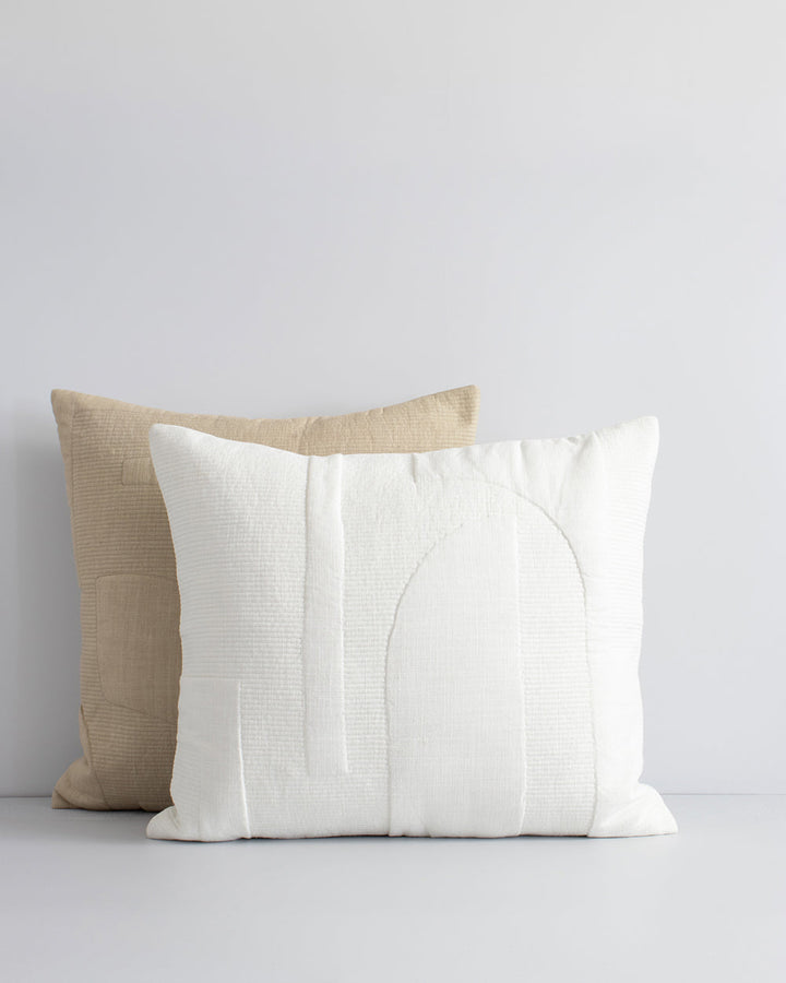 Andes Cushion Brutalist forms are subtly depicted in the quilted and ribbed design of our Andes cushion. Crafted in 100% cotton, the simple ecru colour palette distinguishes the surface design and creates a composed and considered space for living. Pair w