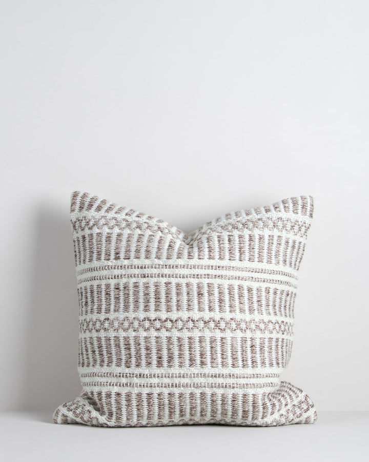 Morgan Cushion A natural, artisan aesthetic is reflected in the stunning design of this outdoor cushion. Handwoven from soft PET yarn (derived from recycled plastic bottles), the Morgan features a beautiful woven design in hues of cocoa and ivory. Pair wi