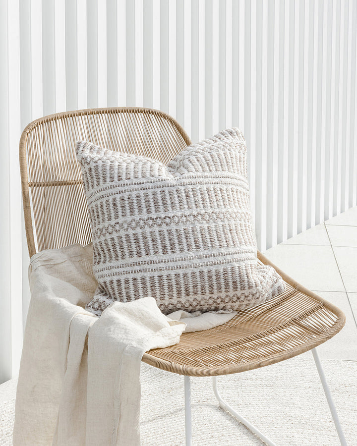 Morgan Cushion A natural, artisan aesthetic is reflected in the stunning design of this outdoor cushion. Handwoven from soft PET yarn (derived from recycled plastic bottles), the Morgan features a beautiful woven design in hues of cocoa and ivory. Pair wi