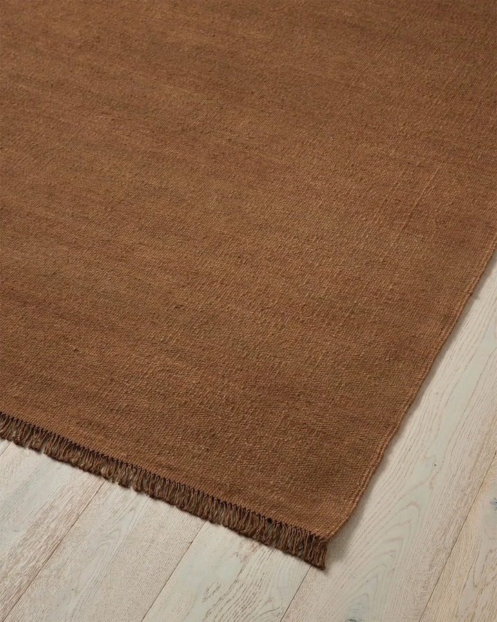 Emilio Toffee - Premium Flat-Weave Rug Discover Emilio Toffee, a sophisticated linen rug with rich golden tones and timeless charm, perfect for modern interiors.