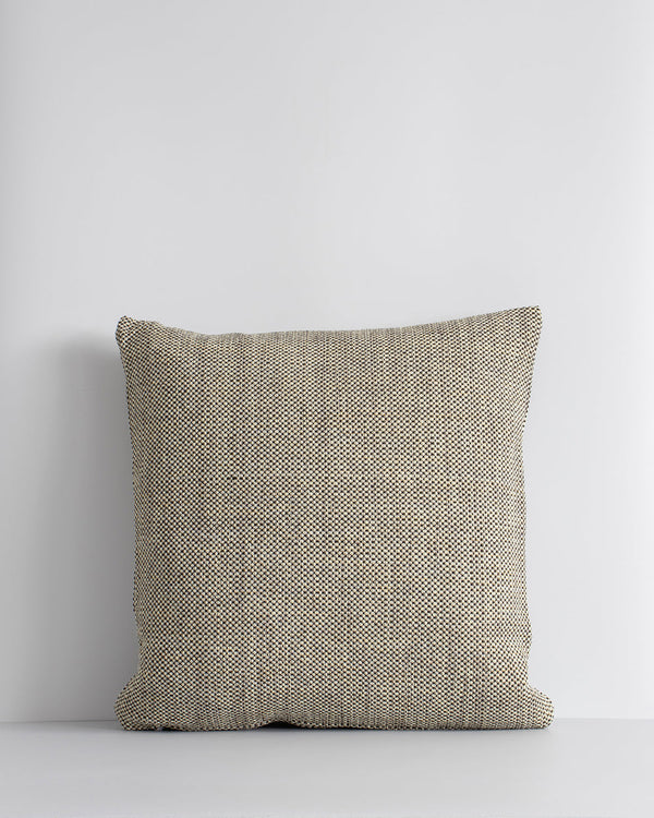 Nandi Cushion Create an outdoor sanctuary with the pared-back design of our Nandi cushion. Handwoven in a textural 1-1 weave, the Nandiâ€™s stylish taupe colourway is the perfect base upon which to mix-and-match cushion styles. Made from durable materials