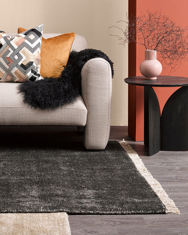 Nolan Floor Rug Hand-knotted from a velvety blend of bamboo silk and wool, the Nolan is perfect for formal living spaces and lavish bedrooms. Featuring a delicate short fringe and a soft mid-height pile, this understated floor rug is both simple and luxur