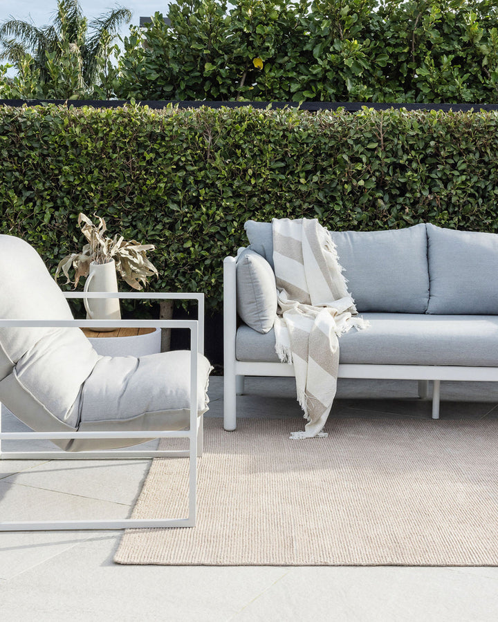 Orakei Floor Rug The Orakei outdoor rug is incredibly versatile, being suitable for both indoor and outdoor spaces. Handwoven from 100% PET fibres (derived from recycled plastic bottles). The hard-wearing nature of the Orakei makes it perfect for busy hou