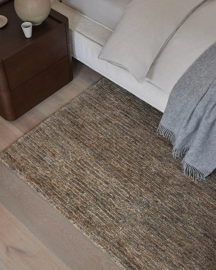 Bastian Fossil - Natural Jute Rug Discover the Bastian Fossil rug, a handcrafted jute masterpiece offering durability and unique texture for your home.