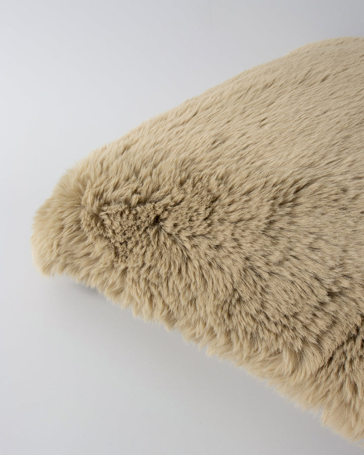 Pele Cushion Relax into the soft, plush pile of Pele faux fur. Crafted from dense strands of fur in a rich seaweed tone, these sumptuous pieces are designed to add a tactile, cosy aesthetic to your space. Irresistible to both look at and touch, this colou