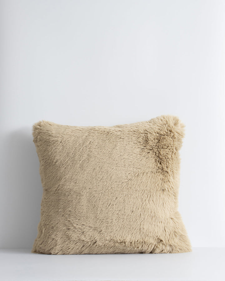 Pele Cushion Relax into the soft, plush pile of Pele faux fur. Crafted from dense strands of fur in a rich seaweed tone, these sumptuous pieces are designed to add a tactile, cosy aesthetic to your space. Irresistible to both look at and touch, this colou