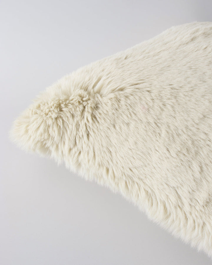 Pele Cushion Relax into the soft, plush pile of Pele faux fur. Crafted from dense strands of fur in a rich seaweed tone, these sumptuous pieces are designed to add a tactile, cosy aesthetic to your space. Irresistible to both look at and touch, this colou