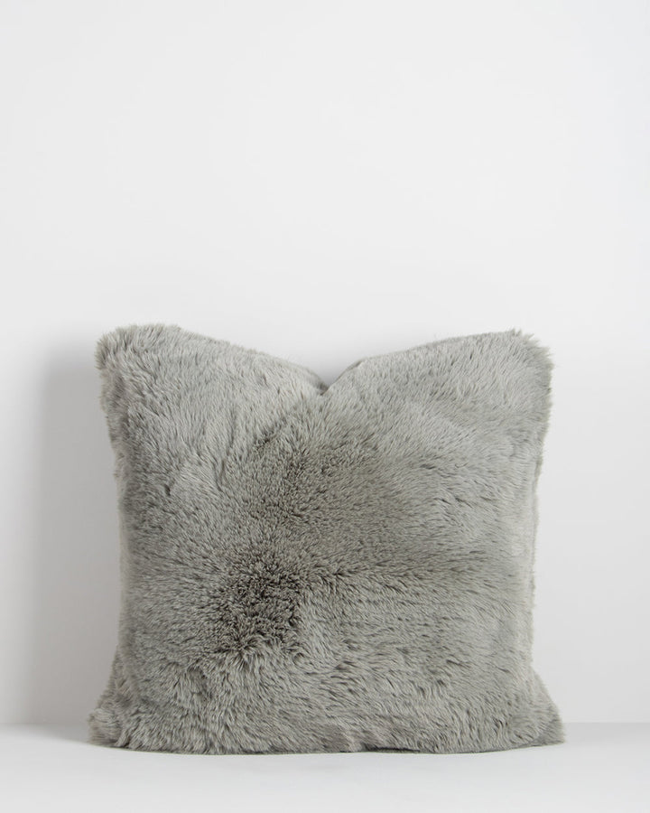 Pele Cushion Relax into the soft, plush pile of Pele faux fur. Crafted from dense strands of fur in a rich seaweed tone, these sumptuous pieces are designed to add a tactile, cosy aesthetic to your space. Irresistible to both look at and touch, this colou