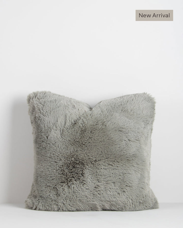 Pele Cushion Relax into the soft, plush pile of Pele faux fur. Crafted from dense strands of fur in a rich seaweed tone, these sumptuous pieces are designed to add a tactile, cosy aesthetic to your space. Irresistible to both look at and touch, this colou