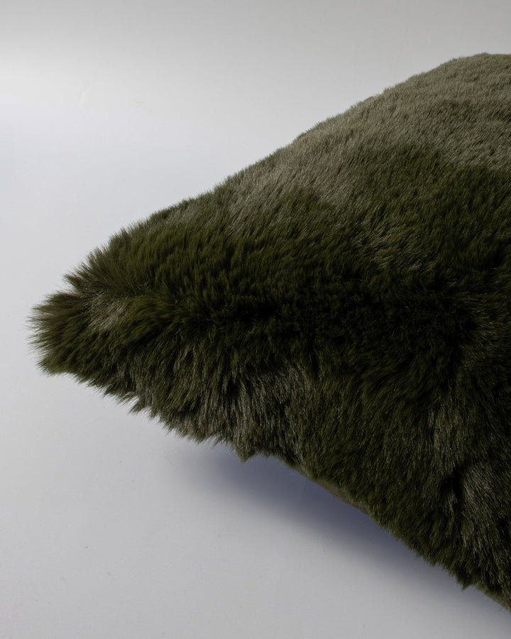 Pele Cushion Relax into the soft, plush pile of Pele faux fur. Crafted from dense strands of fur in a rich seaweed tone, these sumptuous pieces are designed to add a tactile, cosy aesthetic to your space. Irresistible to both look at and touch, this colou