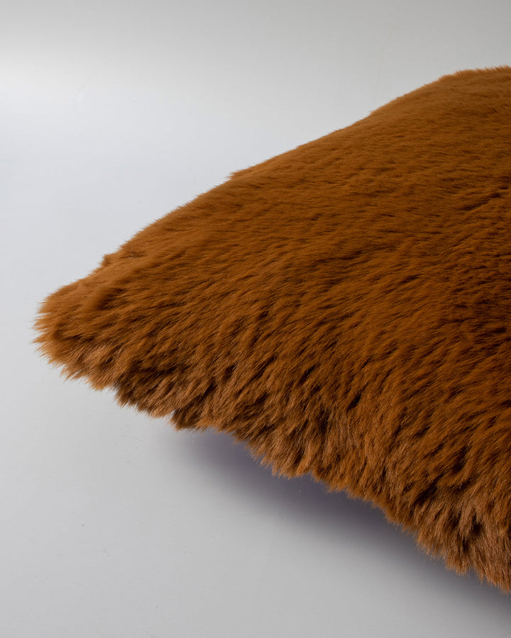 Pele Cushion Relax into the soft, plush pile of Pele faux fur. Crafted from dense strands of fur in a rich seaweed tone, these sumptuous pieces are designed to add a tactile, cosy aesthetic to your space. Irresistible to both look at and touch, this colou