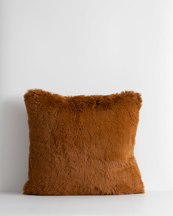 Pele Cushion Relax into the soft, plush pile of Pele faux fur. Crafted from dense strands of fur in a rich seaweed tone, these sumptuous pieces are designed to add a tactile, cosy aesthetic to your space. Irresistible to both look at and touch, this colou