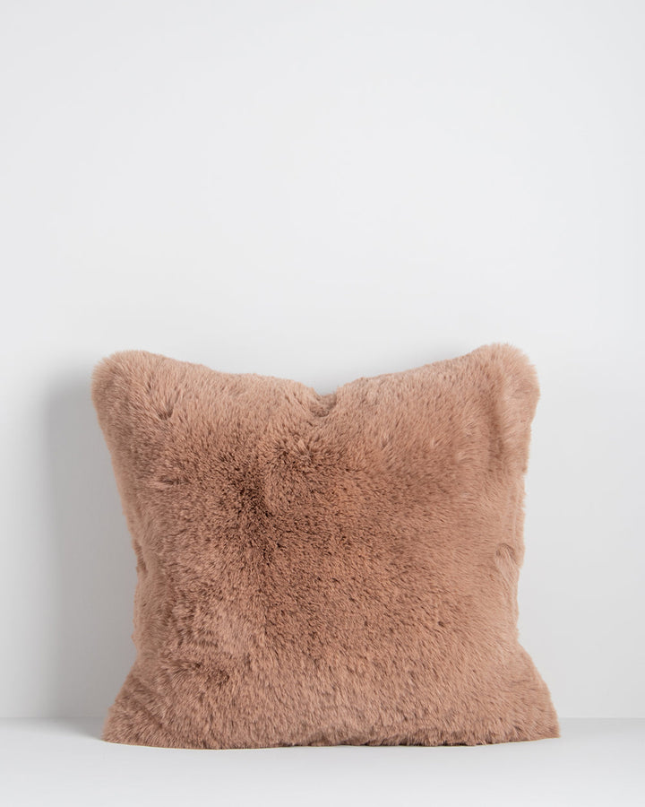 Pele Cushion Relax into the soft, plush pile of Pele faux fur. Crafted from dense strands of fur in a rich seaweed tone, these sumptuous pieces are designed to add a tactile, cosy aesthetic to your space. Irresistible to both look at and touch, this colou