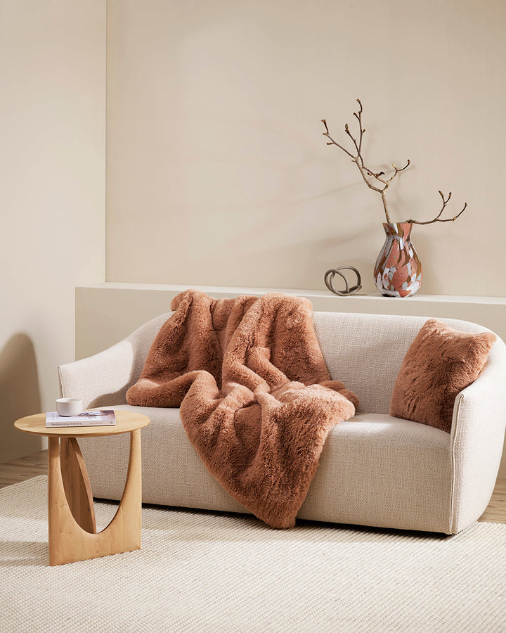 Pele Cushion Relax into the soft, plush pile of Pele faux fur. Crafted from dense strands of fur in a rich seaweed tone, these sumptuous pieces are designed to add a tactile, cosy aesthetic to your space. Irresistible to both look at and touch, this colou