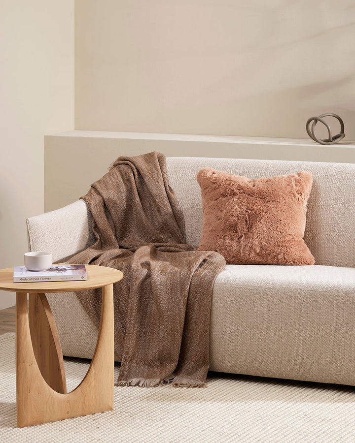 Pele Cushion Relax into the soft, plush pile of Pele faux fur. Crafted from dense strands of fur in a rich seaweed tone, these sumptuous pieces are designed to add a tactile, cosy aesthetic to your space. Irresistible to both look at and touch, this colou