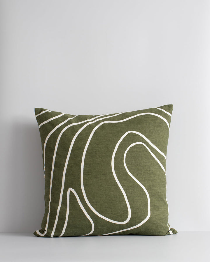 Picchu Cushion A mindful, harmonious way of living is reflected in the design of this olive-toned cushion. The flow of nature is subtly depicted with painterly lines, hand-drawn onto a linen-cotton base. Pair with ecru and moss tones to create a balanced