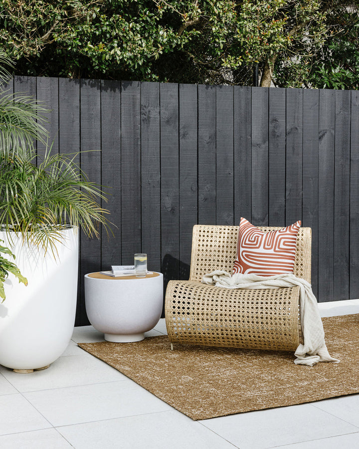 Rattan Floor Rug Add effortless style to your outdoors with the relaxed aesthetic of our Rattan outdoor rug. A stunning, textural piece, Rattanâ€™s durable composition is easy to care for, and translates well indoors for areas of high-traffic. Rich in tex