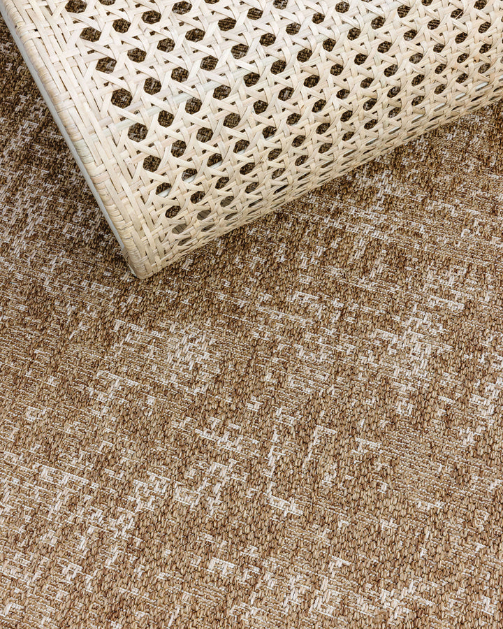 Rattan Floor Rug Add effortless style to your outdoors with the relaxed aesthetic of our Rattan outdoor rug. A stunning, textural piece, Rattanâ€™s durable composition is easy to care for, and translates well indoors for areas of high-traffic. Rich in tex