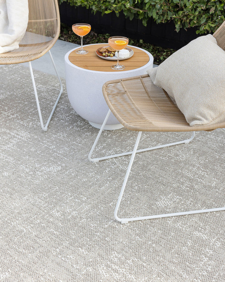 Rattan Floor Rug Add effortless style to your outdoors with the relaxed aesthetic of our Rattan outdoor rug. A stunning, textural piece, Rattanâ€™s durable composition is easy to care for, and translates well indoors for areas of high-traffic. Rich in tex