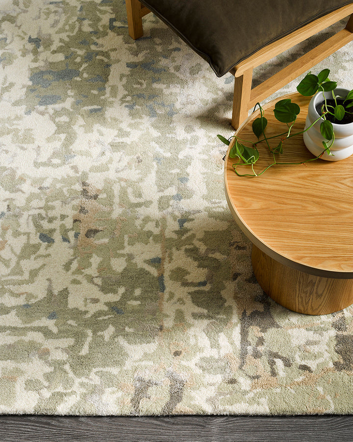 Reiner Floor Rug Inspired by dapple forms of shadow in nature, the Reiner has been handtufted by skilled artisans in a beautiful wool-viscose blend. Featuring a subtle shimmer, the soft underfoot pile and distinctive design makes this a key piece for crea