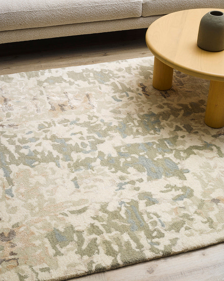 Reiner Floor Rug Inspired by dapple forms of shadow in nature, the Reiner has been handtufted by skilled artisans in a beautiful wool-viscose blend. Featuring a subtle shimmer, the soft underfoot pile and distinctive design makes this a key piece for crea