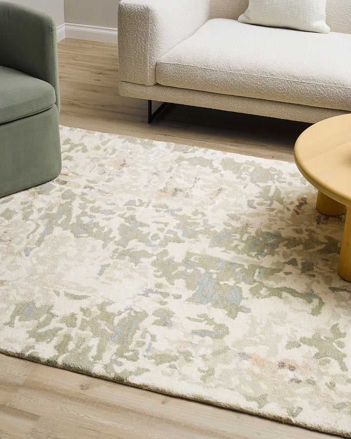 Reiner Floor Rug Inspired by dapple forms of shadow in nature, the Reiner has been handtufted by skilled artisans in a beautiful wool-viscose blend. Featuring a subtle shimmer, the soft underfoot pile and distinctive design makes this a key piece for crea