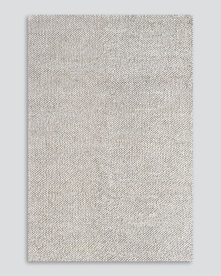 Roxburgh Floor Rug Bring a stylish and sophisticated feel to your space with the textured beauty of our Roxburgh floor rug. Carefully handmade, wool blend fibres are woven into tight bobbles, showcasing the fibreâ€™s tonal blends. An easy addition for any