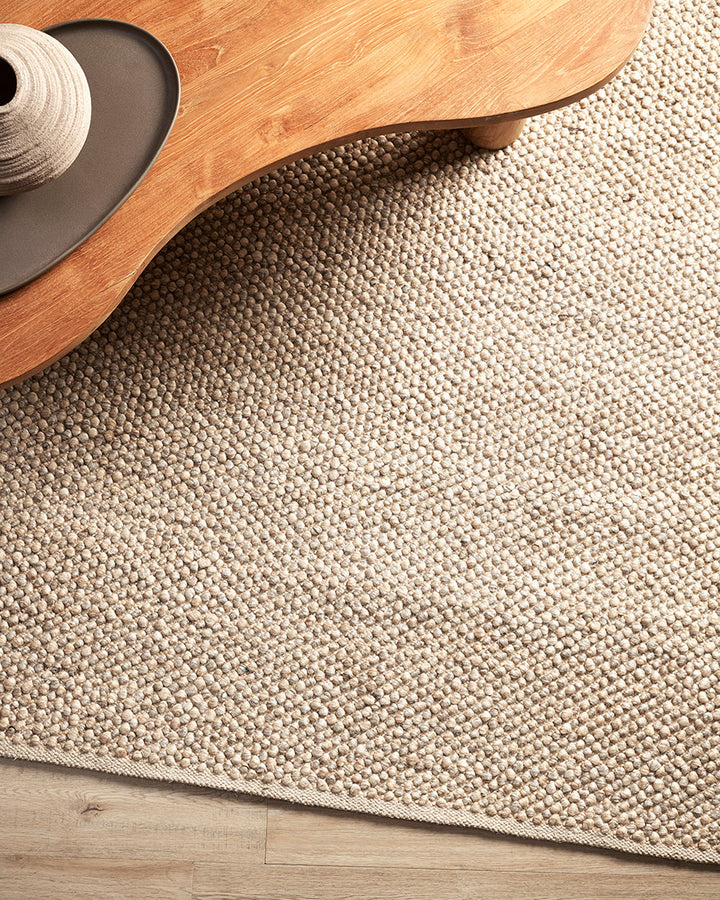 Roxburgh Floor Rug Bring a stylish and sophisticated feel to your space with the textured beauty of our Roxburgh floor rug. Carefully handmade, wool blend fibres are woven into tight bobbles, showcasing the fibreâ€™s tonal blends. An easy addition for any