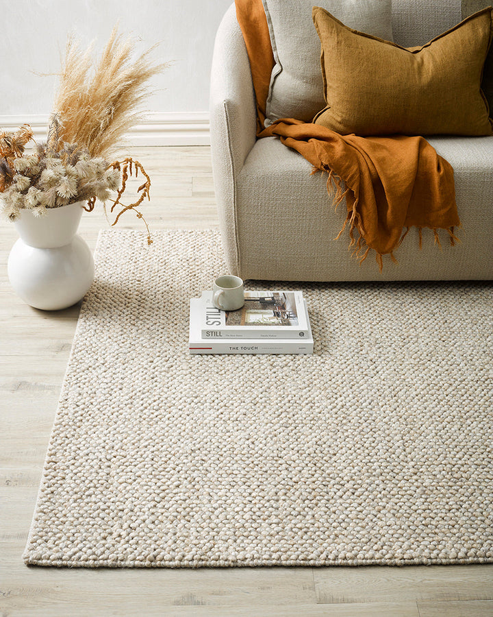 Roxburgh Floor Rug Bring a stylish and sophisticated feel to your space with the textured beauty of our Roxburgh floor rug. Carefully handmade, wool blend fibres are woven into tight bobbles, showcasing the fibreâ€™s tonal blends. An easy addition for any