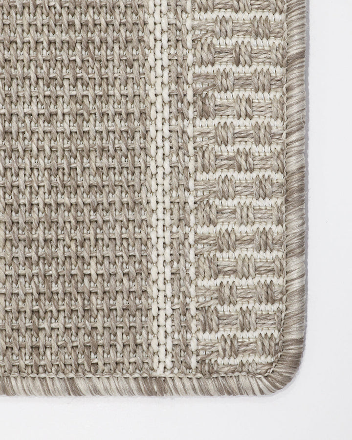 San Jose Floor Rug Featuring a simple weave and thick border design, the San Joseâ€™s soothing stone colourway provides the perfect base for styling a minimal and refined exterior space. The durable character of this piece make it perfect for outdoors, in