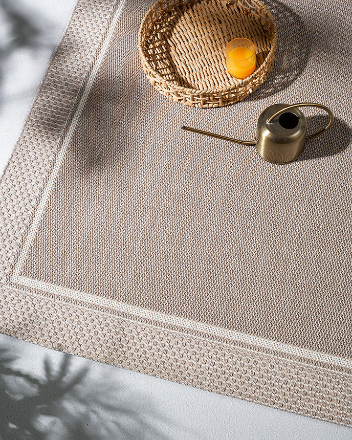 San Jose Floor Rug Featuring a simple weave and thick border design, the San Joseâ€™s soothing stone colourway provides the perfect base for styling a minimal and refined exterior space. The durable character of this piece make it perfect for outdoors, in