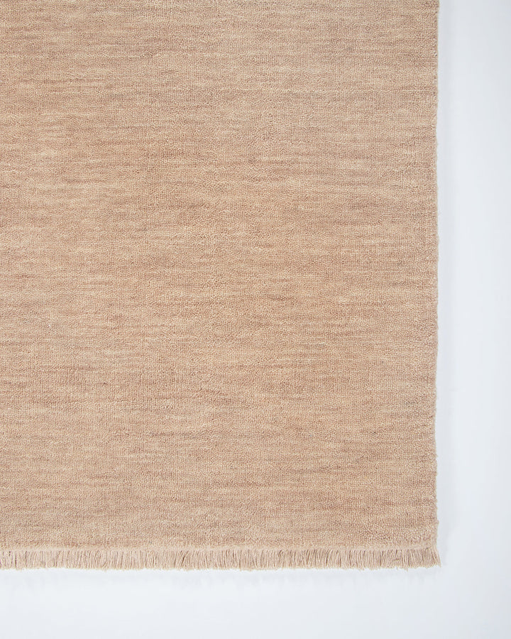 Sandringham Floor Rug Create a sophisticated sanctuary with the dense, sumptuous pile of the Sandringham. Soft and supportive underfoot, this floor rug is handknotted from 100% wool, featuring a cut pile and delicate fringing at both ends. The neutral fog