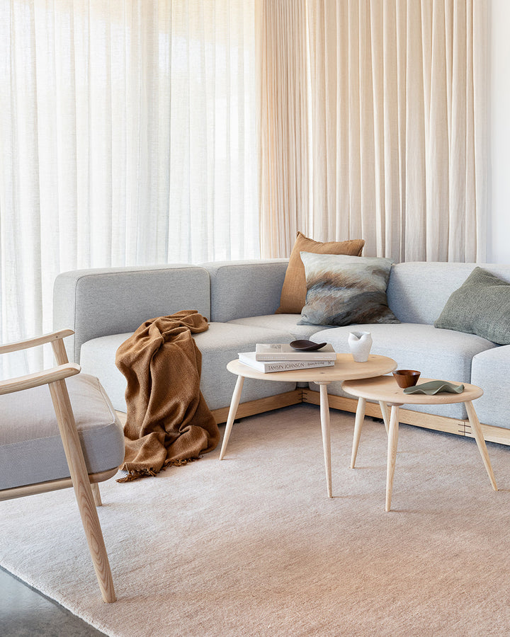 Sandringham Floor Rug Create a sophisticated sanctuary with the dense, sumptuous pile of the Sandringham. Soft and supportive underfoot, this floor rug is handknotted from 100% wool, featuring a cut pile and delicate fringing at both ends. The neutral fog