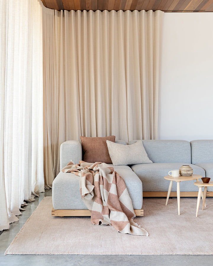 Sandringham Floor Rug Create a sophisticated sanctuary with the dense, sumptuous pile of the Sandringham. Soft and supportive underfoot, this floor rug is handknotted from 100% wool, featuring a cut pile and delicate fringing at both ends. The neutral fog