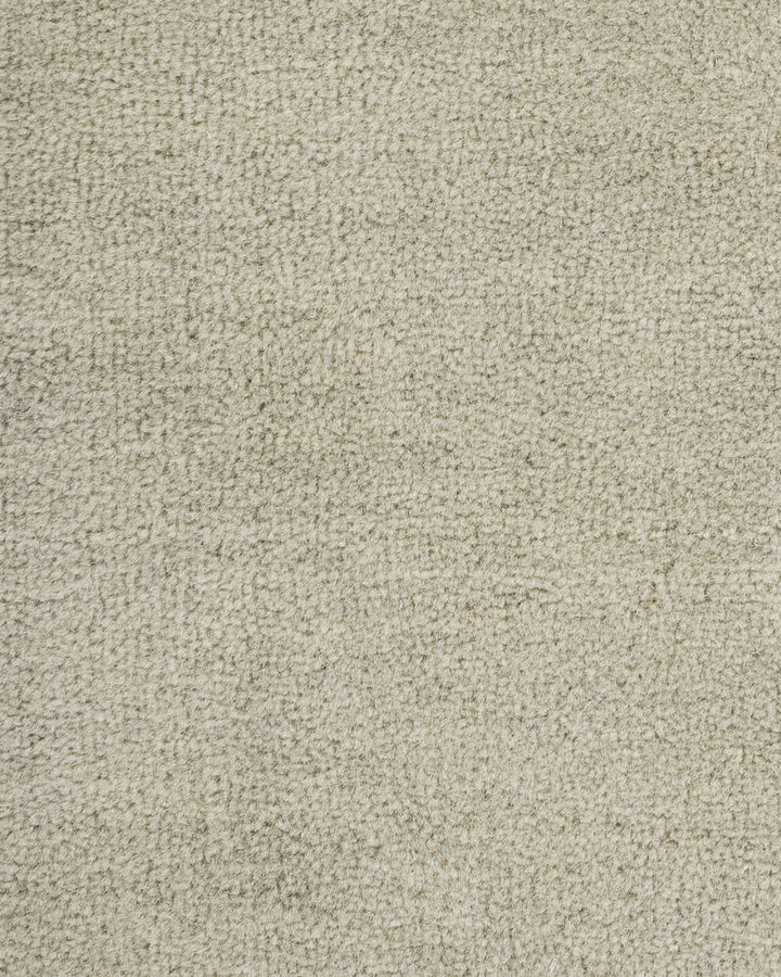 Sandringham Floor Rug Create a sophisticated sanctuary with the dense, sumptuous pile of the Sandringham. Soft and supportive underfoot, this floor rug is handknotted from 100% wool, featuring a cut pile and delicate fringing at both ends. The neutral fog