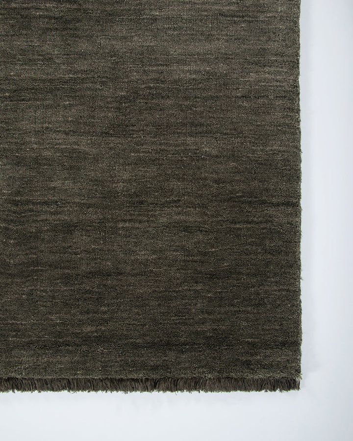 Sandringham Floor Rug Create a sophisticated sanctuary with the dense, sumptuous pile of the Sandringham. Soft and supportive underfoot, this floor rug is handknotted from 100% wool, featuring a cut pile and delicate fringing at both ends. The neutral fog