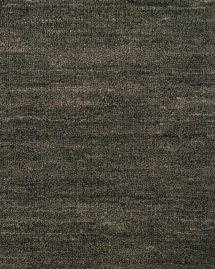 Sandringham Floor Rug Create a sophisticated sanctuary with the dense, sumptuous pile of the Sandringham. Soft and supportive underfoot, this floor rug is handknotted from 100% wool, featuring a cut pile and delicate fringing at both ends. The neutral fog