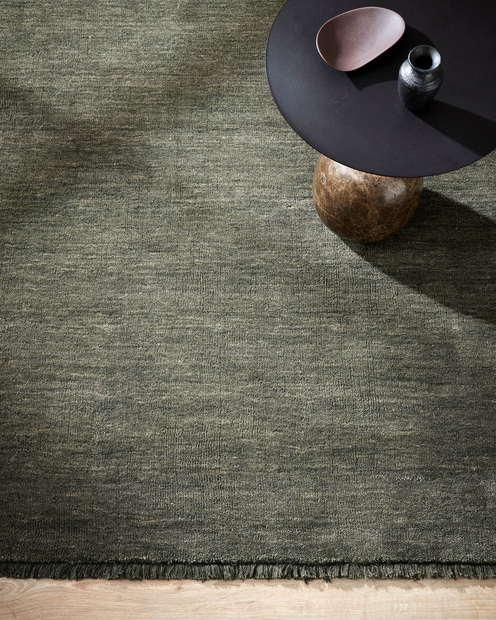 Sandringham Floor Rug Create a sophisticated sanctuary with the dense, sumptuous pile of the Sandringham. Soft and supportive underfoot, this floor rug is handknotted from 100% wool, featuring a cut pile and delicate fringing at both ends. The neutral fog