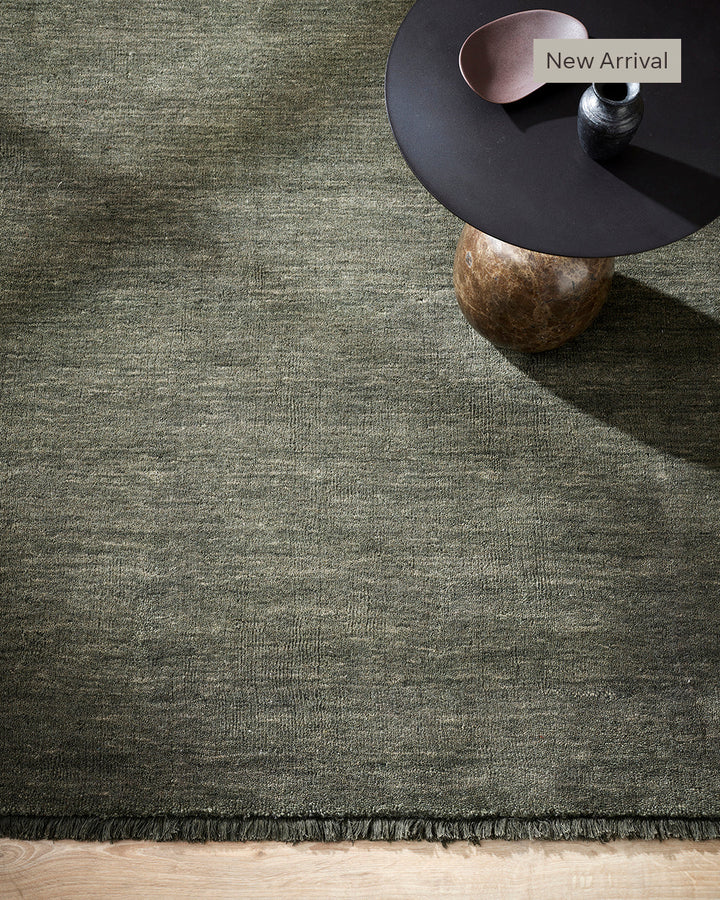 Sandringham Floor Rug Create a sophisticated sanctuary with the dense, sumptuous pile of the Sandringham. Soft and supportive underfoot, this floor rug is handknotted from 100% wool, featuring a cut pile and delicate fringing at both ends. The neutral fog