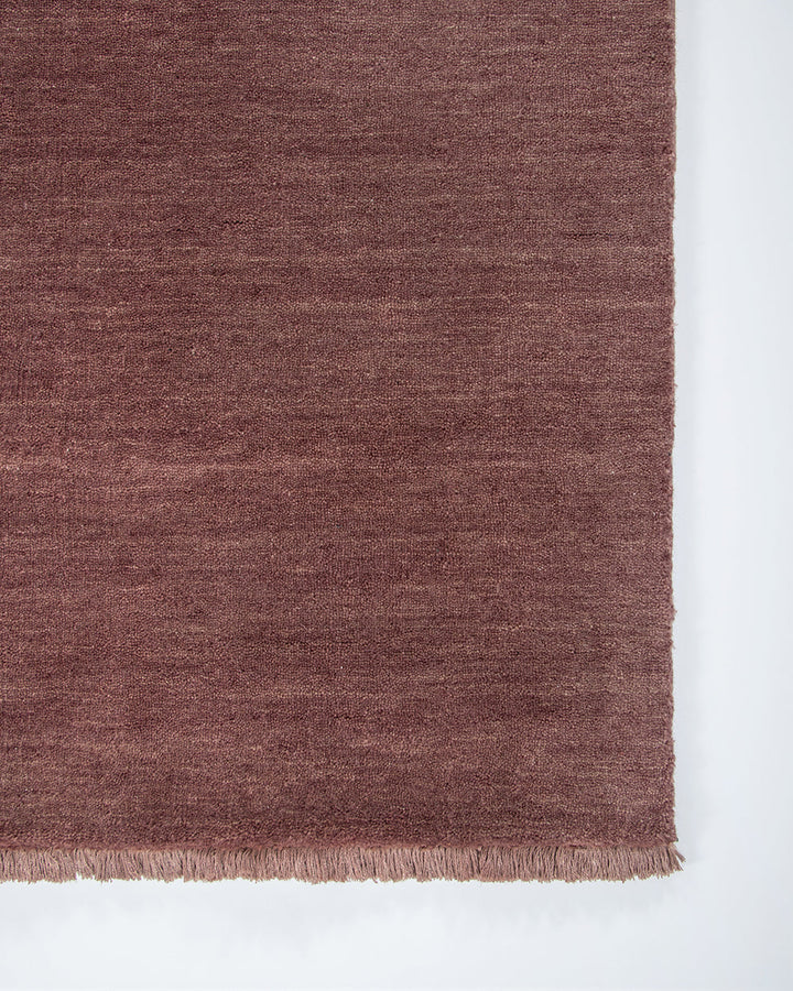Sandringham Floor Rug Create a sophisticated sanctuary with the dense, sumptuous pile of the Sandringham. Soft and supportive underfoot, this floor rug is handknotted from 100% wool, featuring a cut pile and delicate fringing at both ends. The neutral fog