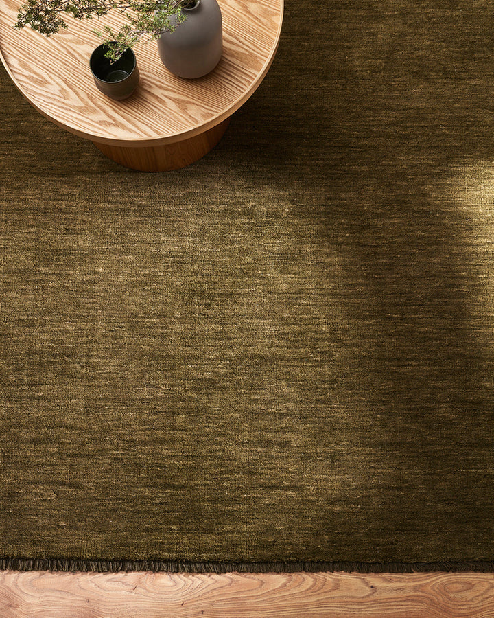 Sandringham Floor Rug Create a sophisticated sanctuary with the dense, sumptuous pile of the Sandringham. Soft and supportive underfoot, this floor rug is handknotted from 100% wool, featuring a cut pile and delicate fringing at both ends. The neutral fog